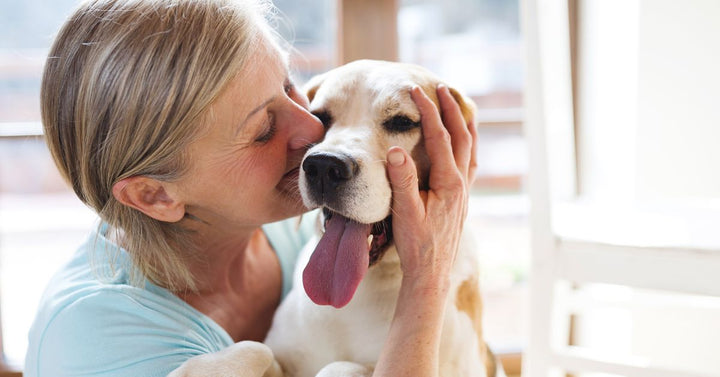 Senior Woman and Dog⁠